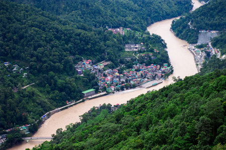 Beautiful landscape view of the river and the village in the mountains
