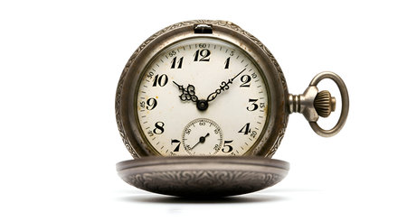 A rusty pocket watch, centered on white surfaceの素材