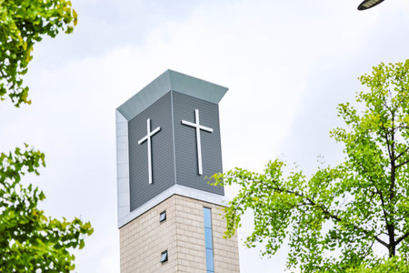 Christian church building with cross architecture, perfect for inspirational messages or Bible verse...