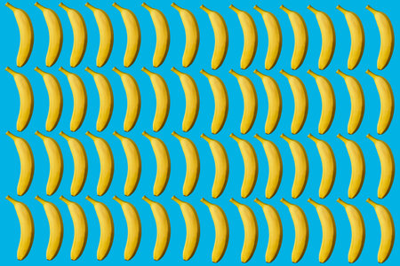 Bananas isolated on blueの写真素材