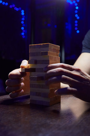 Table game. In ambient light and haze. Club atmosphere. Plays a board game.の写真素材