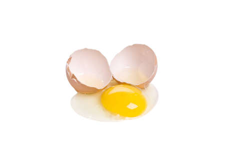 broken egg isolated over white background