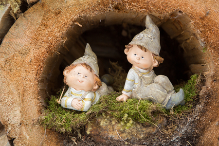 Little elves in a hollow logの写真素材