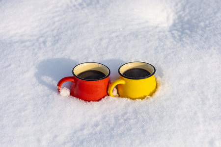 Coffee in a cup on the background of a winter themeの写真素材