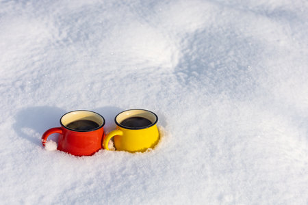 Coffee in a cup on the background of a winter themeの写真素材