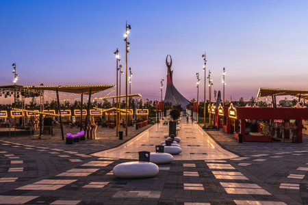 Tashkent, Uzbekistan - April 19, 2023: Memorial of Freedom and Independence in the form of a pyramid on the square of the city park "New Uzbekistan" (Yangi Uzbekistan) with a tower where the Humo birdのeditorial素材