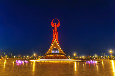 Tashkent, Uzbekistan - April 19, 2023: Memorial of Freedom and Independence in the form of a pyramid on the square of the city park "New Uzbekistan" (Yangi Uzbekistan) with a tower where the Humo birdのeditorial素材