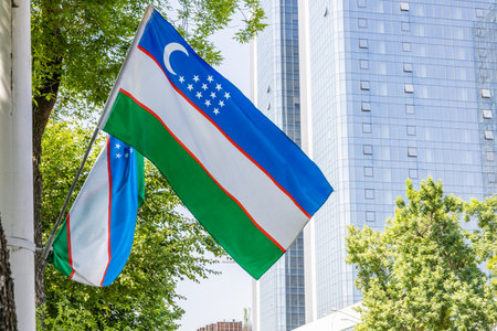 Tashkent, Uzbekistan - April 21, 2023: Flag of the Republic of Uzbekistanのeditorial素材