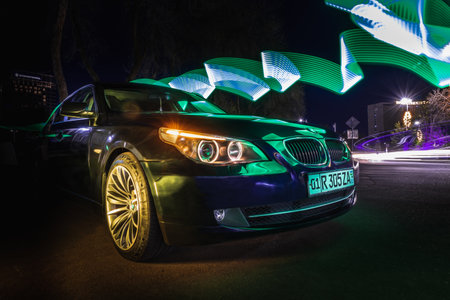 Tashkent, Uzbekistan - March 22, 2023: BMW brand car in the city in interesting lightingのeditorial素材