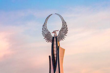 Tashkent, Uzbekistan - April 27, 2023: Memorial of Freedom and Independence in the form of a pyramid with a structure of national color on the square of the city park "New Uzbekistan" (Yangi Uzbekistan) with a tower where the Humo birdのeditorial素材
