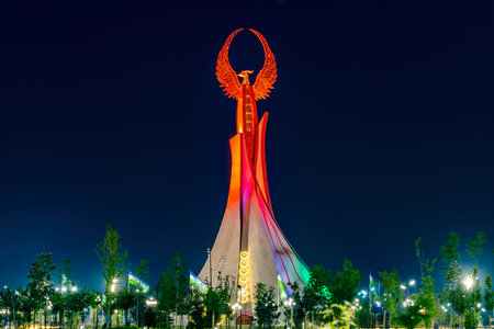 Tashkent, Uzbekistan - April 27, 2023: Memorial of Freedom and Independence in the form of a pyramid with a structure of national color on the square of the city park "New Uzbekistan" (Yangi Uzbekistan) with a tower where the Humo birdのeditorial素材