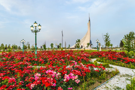 Tashkent, Uzbekistan - May 16, 2023: Memorial of Freedom and Independence in the form of a pyramid with a structure of national color on the square of the city park "New Uzbekistan" (Yangi Uzbekistan) with a tower where the Humo birdのeditorial素材