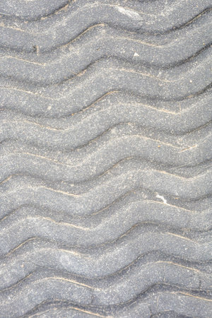 Rubber textured and textured surface