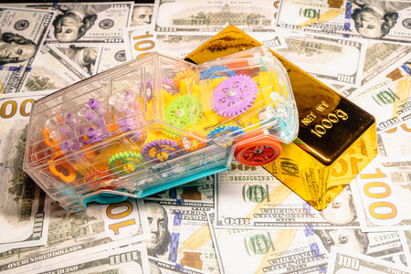 Dollars with gold and car symbols of luxury with business success concept of economic investment.の写真素材
