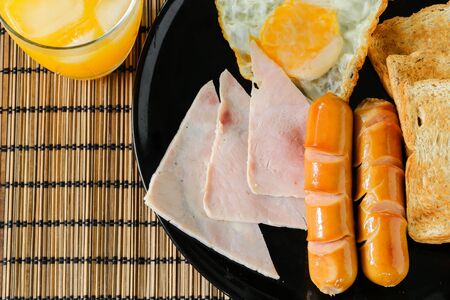 Breakfast set with ham, egg,bread and sausage