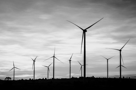 Wind turbines power generator at wind farm - black and white colorの写真素材