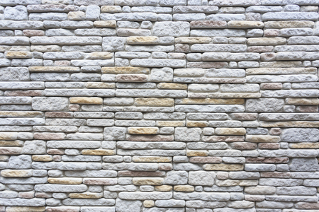 The surface pattern of wall decoration with gray stone, background or texture,の写真素材