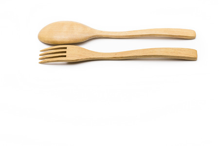 Wooden spoon and Wooden fork isolated on white backgroundの写真素材