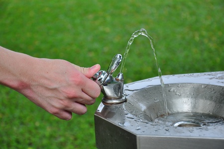 Bangkok,Thailand-April 30 2012-Push the water tapの写真素材