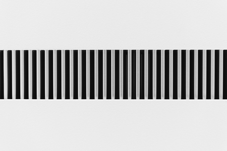 The iron bar rod texture on the wall in low key scene.The shiny of metal bar rod in the wall with the low key scene.の写真素材