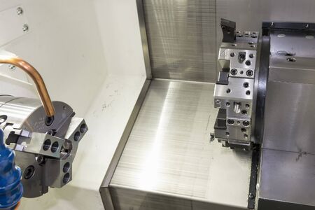 The CNC lath machine,close up to the head stock of CNC lath machine.The CNC turning machine without...