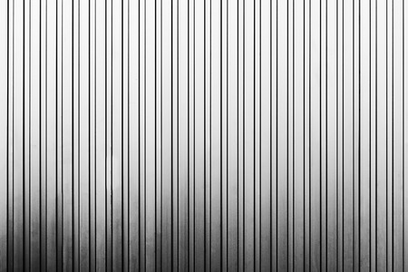 The vertical line texture of metal sheet wall of the factory building