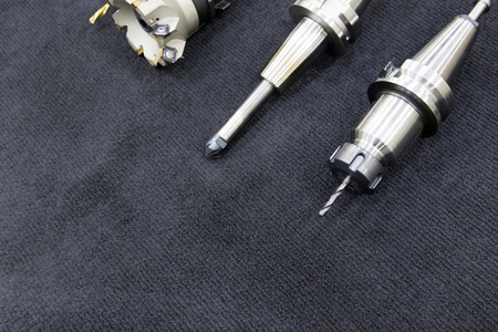 The index-able tool for CNC milling machine on the dark carpet.The various type of cutting tool