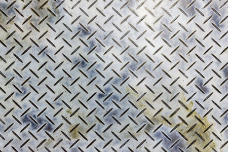 The dirty emboss metal plate for anti-slip reason backgroundの写真素材