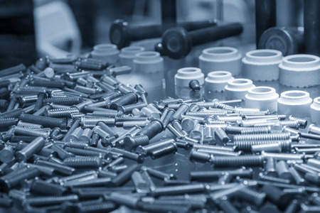 The pile of metal screw thread in the light blue scene.