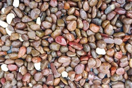 The wet round stone background texture