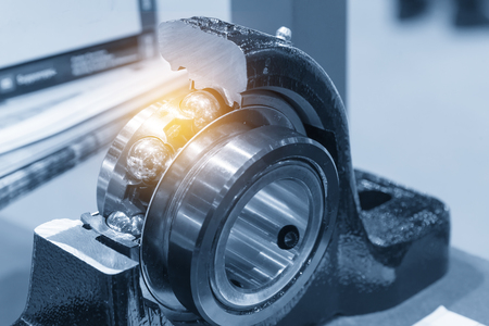 The metal  ball bearing spare part in the section cut .The hi-precision mechanical part.の写真素材