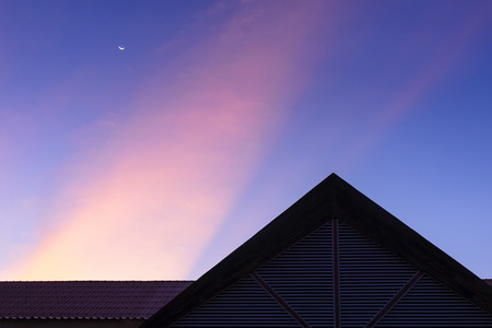 The silhouette scene of the house building with the twilight sky.の写真素材