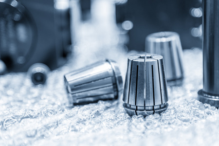 The CNC part ,collet spare parts on the floor.の写真素材