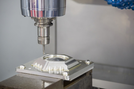 The CNC milling machine cutting the injection mold part with the solid ball endmill tool.The Hi-Technology manufacturing process.の写真素材