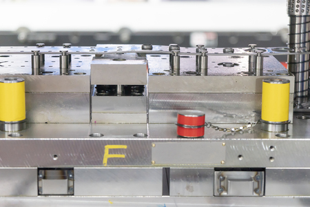 The side view of the progressive die stamping.Hi-technology sheet metal manufacturing process.の写真素材