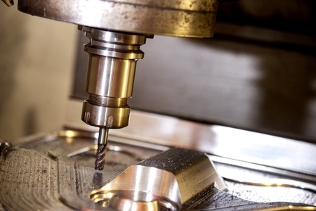 The CNC milling machine cutting the forging mold part by solid radius end mill tool.Mold...
