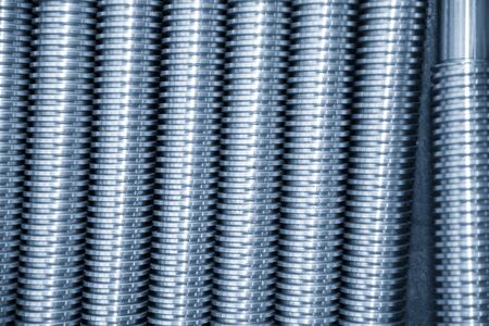Close-up scene texture of the lead screw spare parts. The CNC machine parts manufacturing concept.