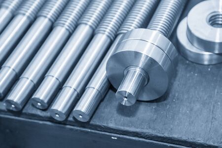 The spare parts of the lead ball screw in the light blue scene. The CNC machine parts manufacturing...