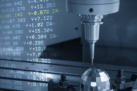 The abstract scene CNC milling machine cutting the sample  parts by   solid ball  endmill tools with G-code data background. The mold and die manufacturing process by machining center .の写真素材