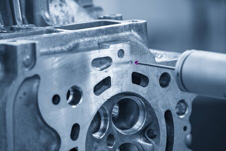 The multi-axis,CMM probe  measure dimension of the aluminium casting cylinder head parts .The...