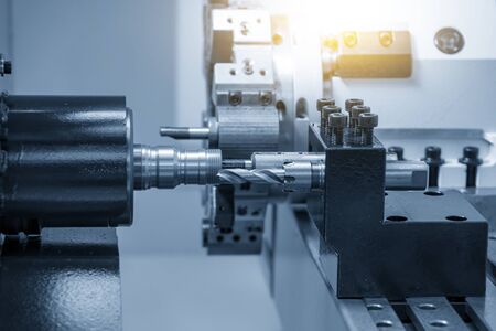 The  multi-tasking CNC lathe machine swiss type tapping at the brass  shaft . The hi-technology...