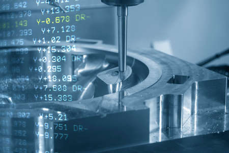 Abstract scene of CNC milling machine and G-code data background cutting the injection mold parts . The hi-technology mold and die manufacturing concept by machining center.の写真素材