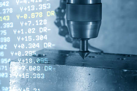 Abstract scene of CNC milling machine and G-code data background chamfer  cut the mold  parts . The hi-technology mold and die manufacturing concept by machining center.の写真素材