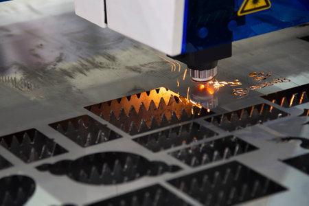 The fiber laser cutting machine cutting  machine cut the metal plate. The hi-technology sheet metal...
