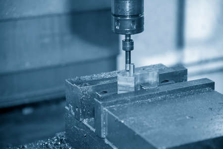 The  CNC  milling machine set-up the work by edge-finder tool. The  mold and die manufacturing concept by machining center.の写真素材