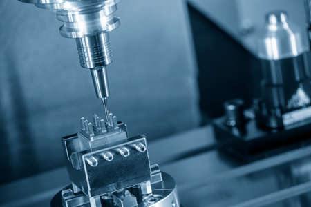 The hi-precision CNC milling machine cutting the copper material for EDM processing. The electrode cutting process  by machining center.の写真素材