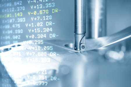 The abstract scene CNC milling machine rough cutting  the mold and die parts and G-code data...