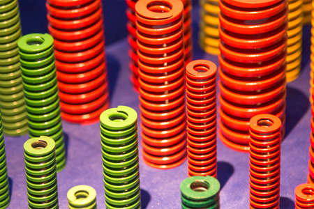 The group of compression wire spring for mold and die industry. The progressive die spare parts manufacturing concept.の写真素材