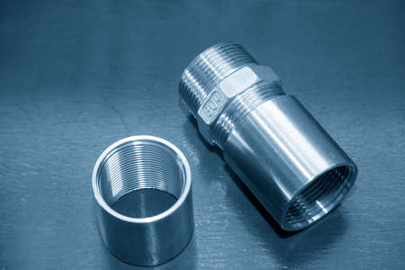The stainless steel 304 grade pipe connector parts. The pipeline parts manufacturing concept.