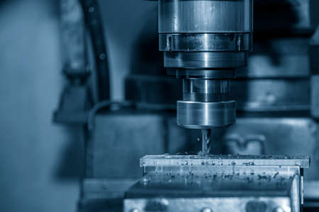 The press die manufacturing process by CNC milling machine with ball end mill tool. The mold parts cutting process by machining center with solid ball end mill.の写真素材